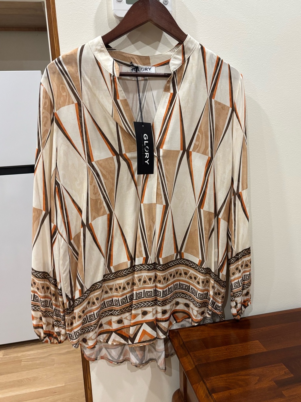 Geometric Print V-Neck Blouse in Cream, Brown and Orange.